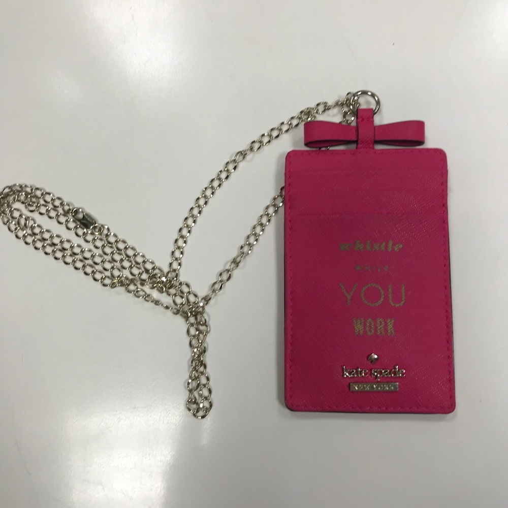 “Whistle while you work” ID lanyard by Kate Spade